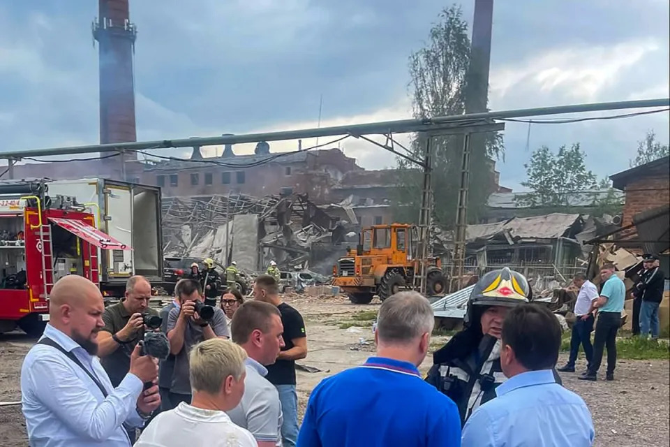 Officials visiting the site of an explosion on the grounds of the Zagorsk plant  (Telegram/@DAkulovSP/AFP via Ge)